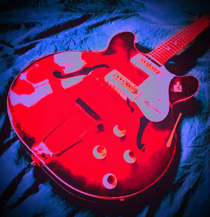 A vibrant red guitar
