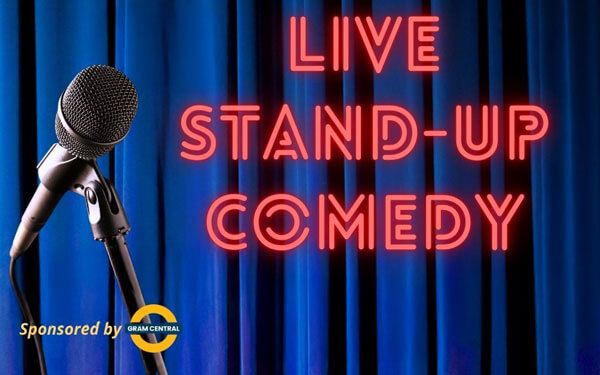 Blue curtain with a mic and the words "Live Comedy"